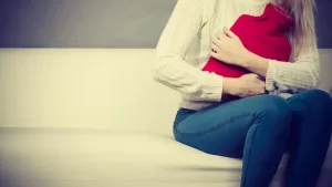 A woman who has had chlamydia infection and now has PID and heavy periods. She is worried about complications such as ectopic pregnancy.