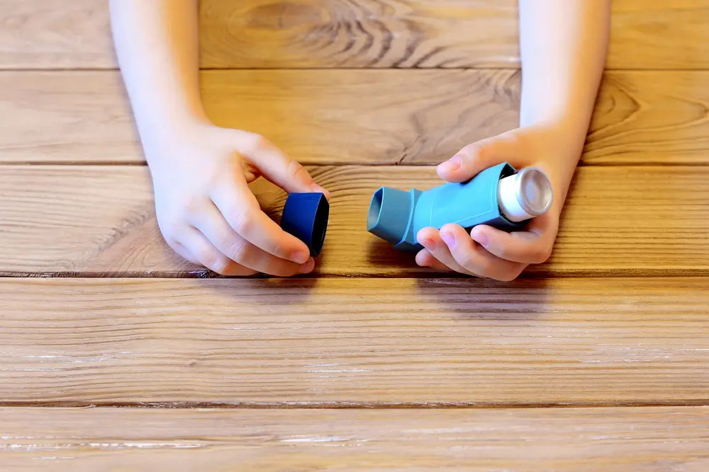 Small,Child,Holds,Asthma,Inhaler,In,His,Hands.,Inhalation,Treatment phimosis