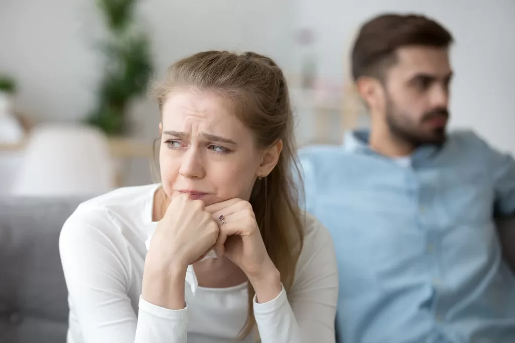 Upset female look in distance thinking of relationships problems or breakup Upset female look in distance thinking of relationships problems or breakup